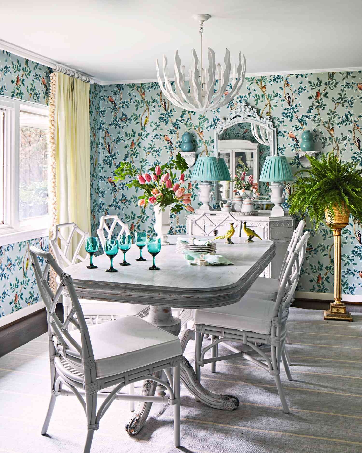 Dining room with patterned wallpaper