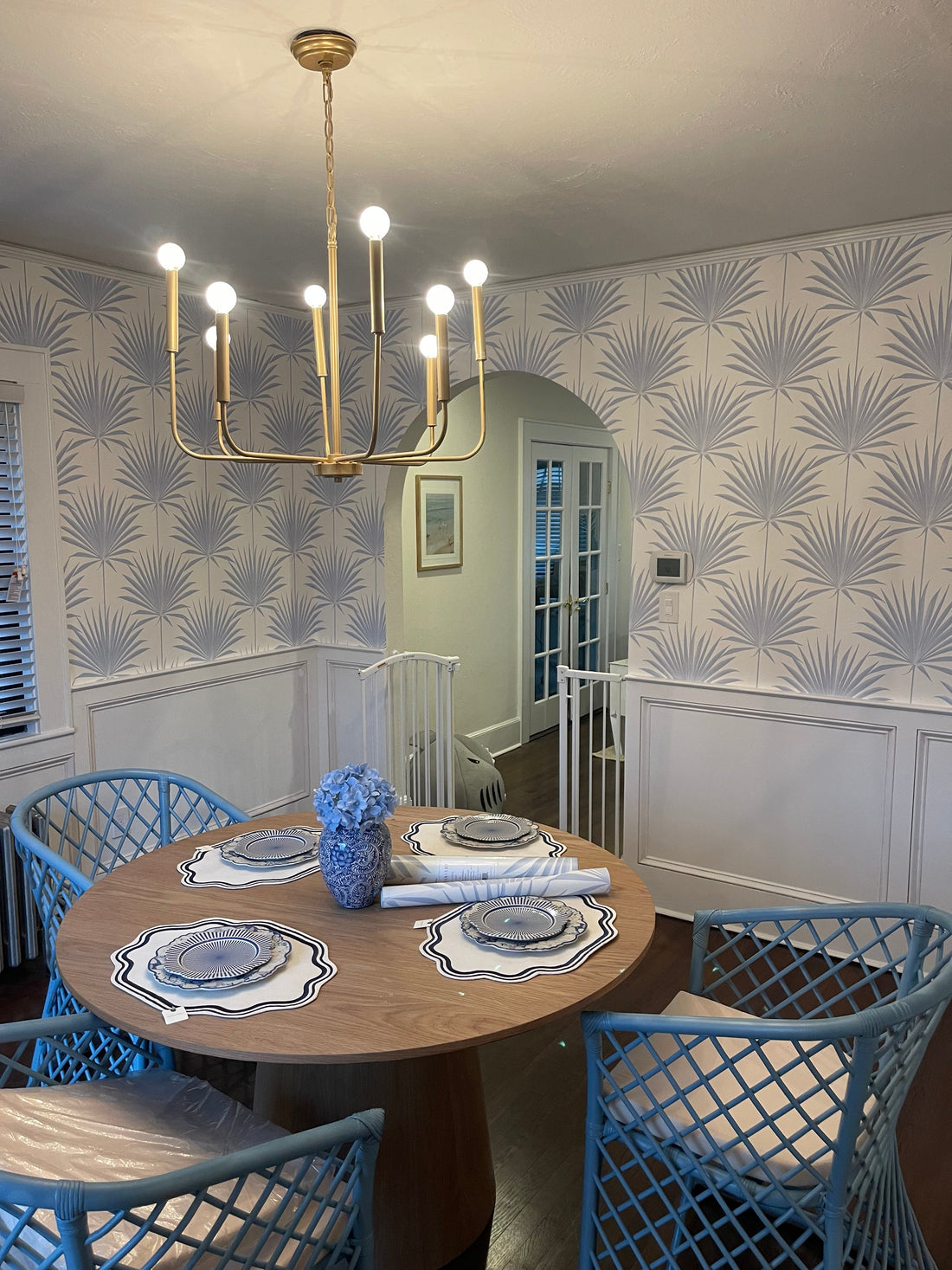 Wallpapered coastal bedroom interior